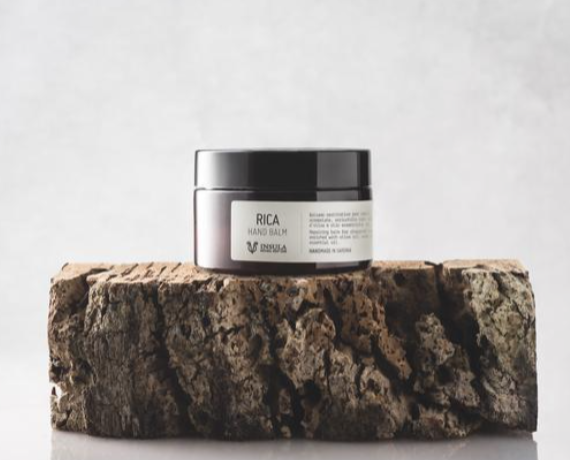 IMMAGINE BARATTOLO AMBRATO CREMA MANI RICA